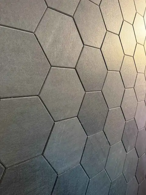 Hexagon acoustic paneling on the studio wall in San Antonio